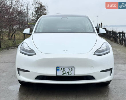 Белый Тесла Model Y, объемом двигателя 0 л и пробегом 77 тыс. км за 25000 $, фото 1 на Automoto.ua
