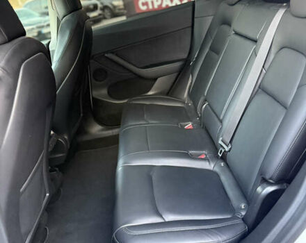 Білий Тесла Model Y, об'ємом двигуна 0 л та пробігом 100 тис. км за 21499 $, фото 15 на Automoto.ua