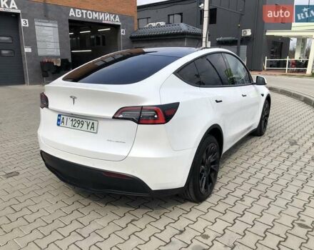 Белый Тесла Model Y, объемом двигателя 0 л и пробегом 51 тыс. км за 26000 $, фото 3 на Automoto.ua