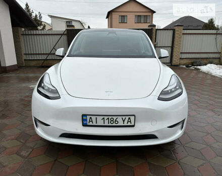 Білий Тесла Model Y, об'ємом двигуна 0 л та пробігом 76 тис. км за 32300 $, фото 2 на Automoto.ua