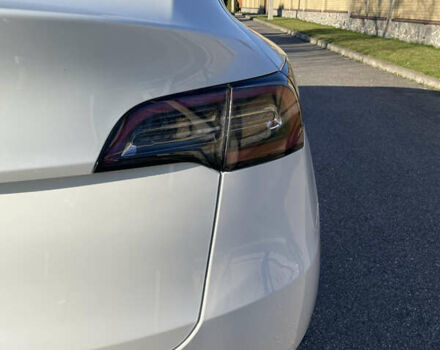 Білий Тесла Model Y, об'ємом двигуна 0 л та пробігом 88 тис. км за 27999 $, фото 11 на Automoto.ua