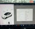 Білий Тесла Model Y, об'ємом двигуна 0 л та пробігом 186 тис. км за 21600 $, фото 17 на Automoto.ua