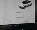 Білий Тесла Model Y, об'ємом двигуна 0 л та пробігом 61 тис. км за 25399 $, фото 1 на Automoto.ua