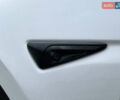 Белый Тесла Model Y, объемом двигателя 0 л и пробегом 77 тыс. км за 25000 $, фото 33 на Automoto.ua