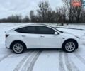 Білий Тесла Model Y, об'ємом двигуна 0 л та пробігом 186 тис. км за 21600 $, фото 1 на Automoto.ua