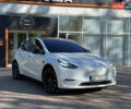 Белый Тесла Model Y, объемом двигателя 0 л и пробегом 84 тыс. км за 28000 $, фото 2 на Automoto.ua