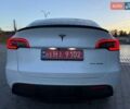 Белый Тесла Model Y, объемом двигателя 0 л и пробегом 132 тыс. км за 20800 $, фото 75 на Automoto.ua