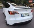Белый Тесла Model Y, объемом двигателя 0 л и пробегом 82 тыс. км за 23000 $, фото 1 на Automoto.ua