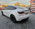 Білий Тесла Model Y, об'ємом двигуна 0 л та пробігом 100 тис. км за 21499 $, фото 11 на Automoto.ua