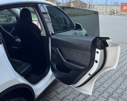 Білий Тесла Model Y, об'ємом двигуна 0 л та пробігом 187 тис. км за 18900 $, фото 29 на Automoto.ua