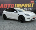 Білий Тесла Model Y, об'ємом двигуна 0 л та пробігом 100 тис. км за 21499 $, фото 1 на Automoto.ua