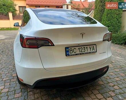 Белый Тесла Model Y, объемом двигателя 0 л и пробегом 65 тыс. км за 28000 $, фото 18 на Automoto.ua