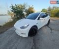 Белый Тесла Model Y, объемом двигателя 0 л и пробегом 106 тыс. км за 23999 $, фото 1 на Automoto.ua