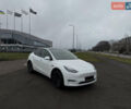 Белый Тесла Model Y, объемом двигателя 0 л и пробегом 104 тыс. км за 21299 $, фото 1 на Automoto.ua