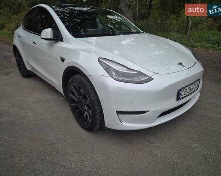 Белый Тесла Model Y, объемом двигателя 0 л и пробегом 104 тыс. км за 23500 $, фото 1 на Automoto.ua