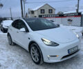 Белый Тесла Model Y, объемом двигателя 0 л и пробегом 128 тыс. км за 19999 $, фото 1 на Automoto.ua