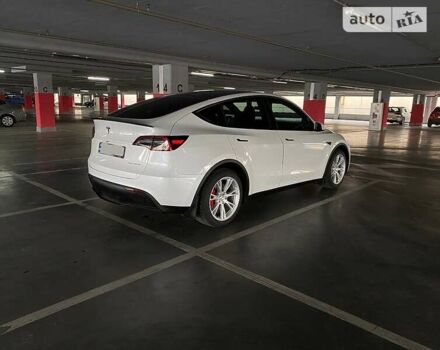 Білий Тесла Model Y, об'ємом двигуна 0 л та пробігом 61 тис. км за 25399 $, фото 3 на Automoto.ua