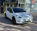 Белый Тесла Model Y, объемом двигателя 0 л и пробегом 84 тыс. км за 28000 $, фото 1 на Automoto.ua