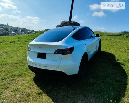 Білий Тесла Model Y, об'ємом двигуна 0 л та пробігом 150 тис. км за 28000 $, фото 10 на Automoto.ua
