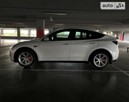 Білий Тесла Model Y, об'ємом двигуна 0 л та пробігом 61 тис. км за 25399 $, фото 6 на Automoto.ua