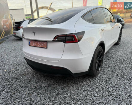 Білий Тесла Model Y, об'ємом двигуна 0 л та пробігом 100 тис. км за 21499 $, фото 17 на Automoto.ua