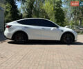 Белый Тесла Model Y, объемом двигателя 0 л и пробегом 84 тыс. км за 28000 $, фото 28 на Automoto.ua