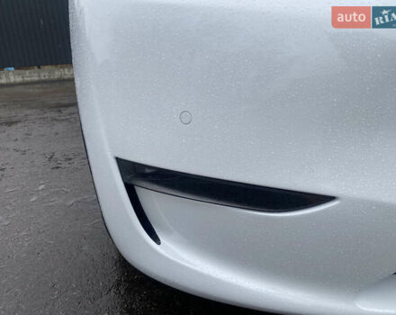 Білий Тесла Model Y, об'ємом двигуна 0 л та пробігом 70 тис. км за 24500 $, фото 37 на Automoto.ua