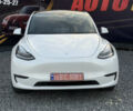 Білий Тесла Model Y, об'ємом двигуна 0 л та пробігом 100 тис. км за 21499 $, фото 1 на Automoto.ua