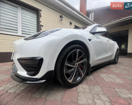 Білий Тесла Model Y, об'ємом двигуна 0 л та пробігом 126 тис. км за 28800 $, фото 1 на Automoto.ua