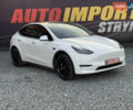 Білий Тесла Model Y, об'ємом двигуна 0 л та пробігом 100 тис. км за 21499 $, фото 5 на Automoto.ua