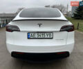 Белый Тесла Model Y, объемом двигателя 0 л и пробегом 77 тыс. км за 25000 $, фото 37 на Automoto.ua
