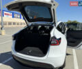 Белый Тесла Model Y, объемом двигателя 0 л и пробегом 110 тыс. км за 27750 $, фото 27 на Automoto.ua