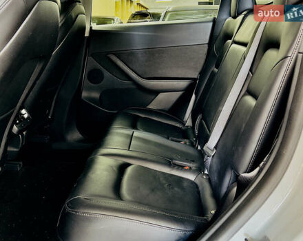 Білий Тесла Model Y, об'ємом двигуна 0 л та пробігом 74 тис. км за 24979 $, фото 11 на Automoto.ua