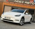 Белый Тесла Model Y, объемом двигателя 0 л и пробегом 51 тыс. км за 23899 $, фото 1 на Automoto.ua