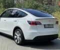 Белый Тесла Model Y, объемом двигателя 0 л и пробегом 65 тыс. км за 29999 $, фото 1 на Automoto.ua