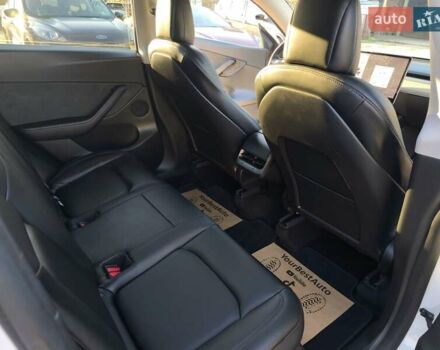 Білий Тесла Model Y, об'ємом двигуна 0 л та пробігом 86 тис. км за 25300 $, фото 16 на Automoto.ua