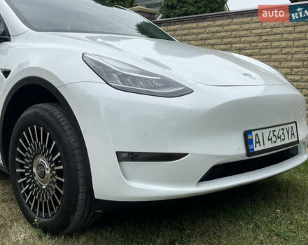 Білий Тесла Model Y, об'ємом двигуна 0 л та пробігом 54 тис. км за 23900 $, фото 2 на Automoto.ua