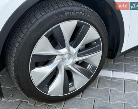 Тесла Model Y 2021 в Хмельницком на Automoto.ua Белый Тесла Model Y, объемом двигателя 0 л и пробегом 83 тыс. км за 25499 $, фото 28 на Automoto.ua