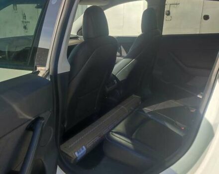 Белый Тесла Model Y, объемом двигателя 0 л и пробегом 76 тыс. км за 23000 $, фото 4 на Automoto.ua