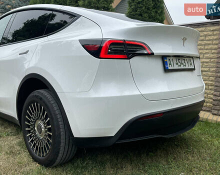Білий Тесла Model Y, об'ємом двигуна 0 л та пробігом 54 тис. км за 23900 $, фото 19 на Automoto.ua