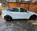 Белый Тесла Model Y, объемом двигателя 0 л и пробегом 76 тыс. км за 27000 $, фото 1 на Automoto.ua