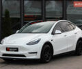 Белый Тесла Model Y, объемом двигателя 0 л и пробегом 51 тыс. км за 23000 $, фото 2 на Automoto.ua