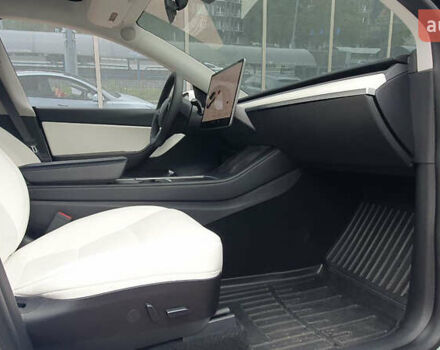 Білий Тесла Model Y, об'ємом двигуна 0 л та пробігом 74 тис. км за 25900 $, фото 7 на Automoto.ua