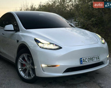 Белый Тесла Model Y, объемом двигателя 0 л и пробегом 57 тыс. км за 30000 $, фото 1 на Automoto.ua