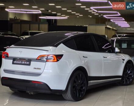 Белый Тесла Model Y, объемом двигателя 0 л и пробегом 58 тыс. км за 26999 $, фото 1 на Automoto.ua