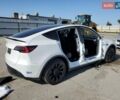 Белый Тесла Model Y, объемом двигателя 0 л и пробегом 74 тыс. км за 19000 $, фото 3 на Automoto.ua