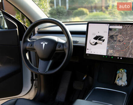 Белый Тесла Model Y, объемом двигателя 0 л и пробегом 103 тыс. км за 28400 $, фото 12 на Automoto.ua