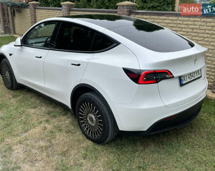 Білий Тесла Model Y, об'ємом двигуна 0 л та пробігом 54 тис. км за 23900 $, фото 18 на Automoto.ua