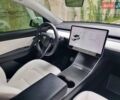 Белый Тесла Model Y, объемом двигателя 0 л и пробегом 98 тыс. км за 26499 $, фото 49 на Automoto.ua