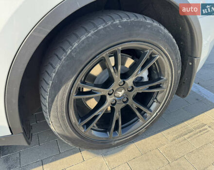 Белый Тесла Model Y, объемом двигателя 0 л и пробегом 155 тыс. км за 20777 $, фото 12 на Automoto.ua